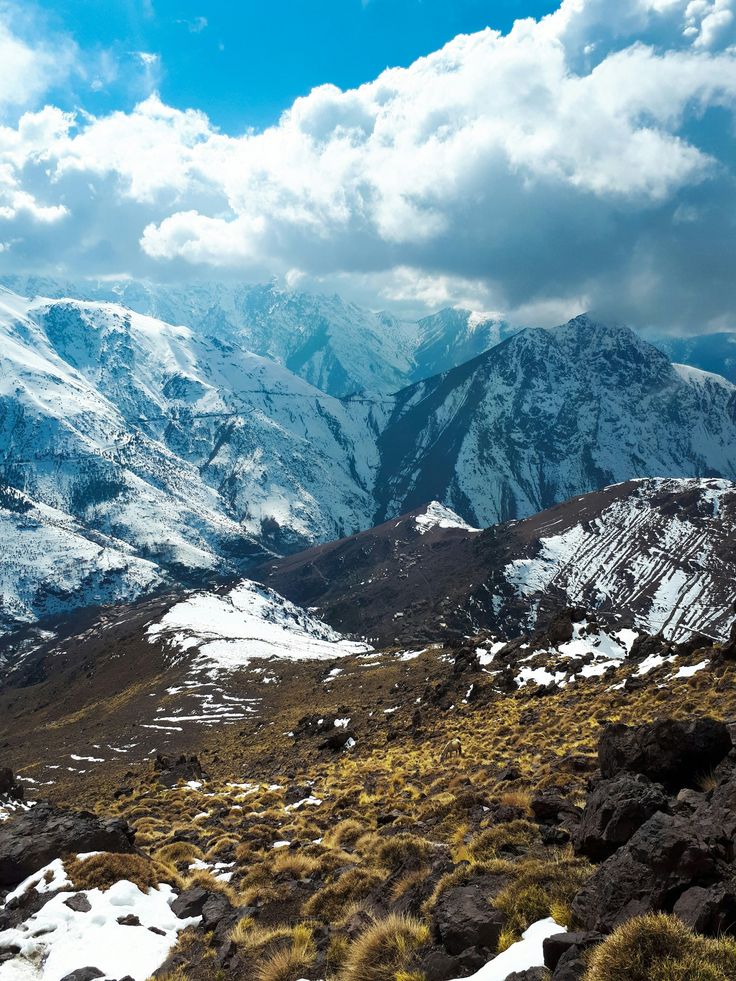 Winding mountain road through the Atlas Mountains in Morocco with dramatic scenery